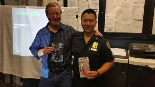 Class instructor and Bike New York Director of Education, Rich Conroy with Sergeant Yip. 