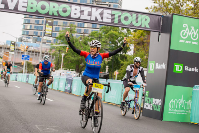 Rider crossing the Finish at the TD Five Boro Bike Tour