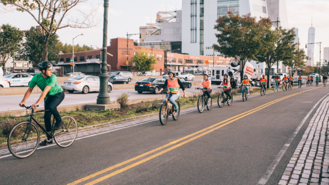Riders on protected bike lane