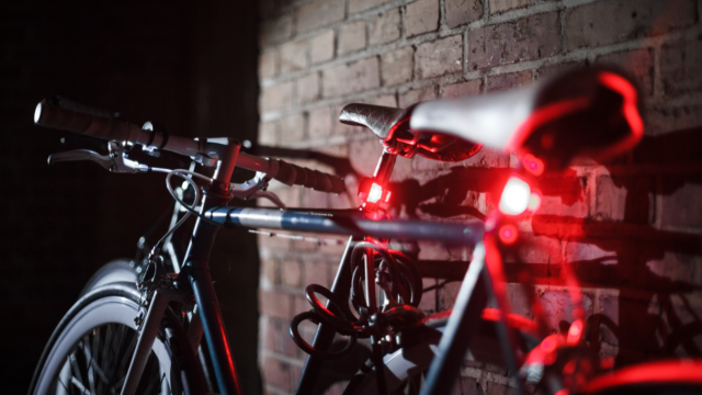Parked bicycle with rear light on: a must for nighttime riding
